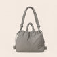 sac à main gris souris en tissu doudoune nylon matelassé imperméable transformable sac à dos